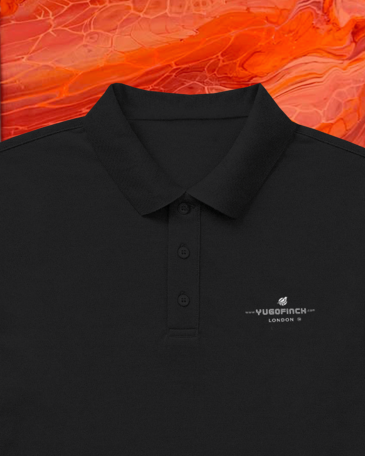 Black polo shirt with a logo on an orange and red marbled background