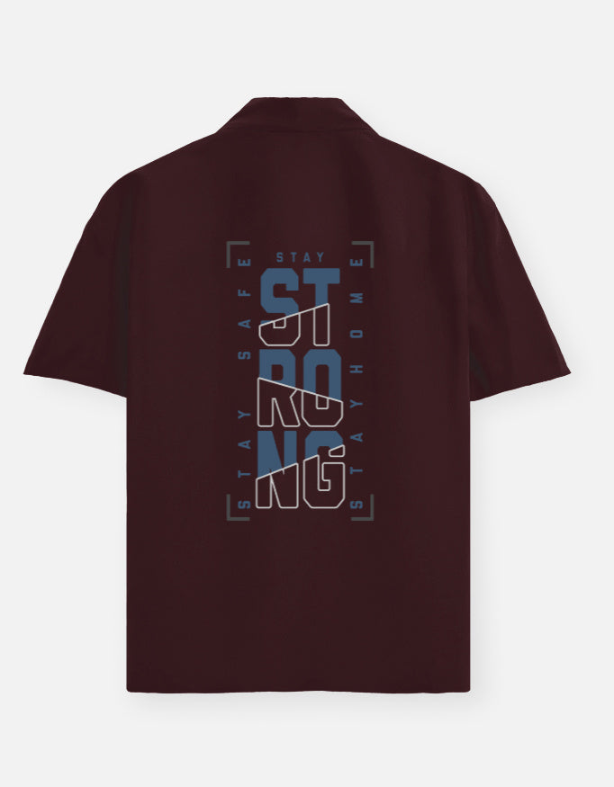 Brown shirt with blue and white text on the back against a white background
