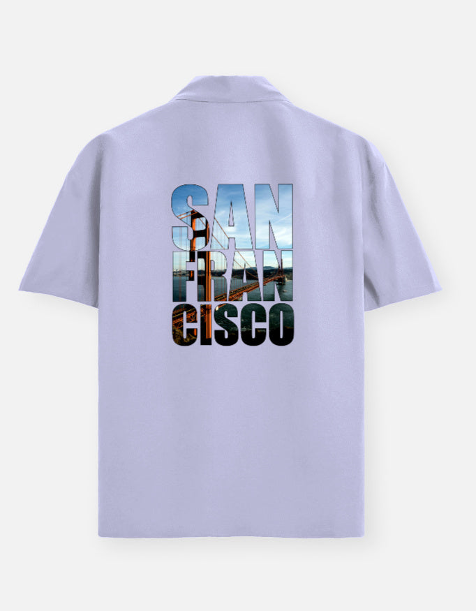 Light purple polo shirt with 'San Francisco Cisco' text on the back against a white background