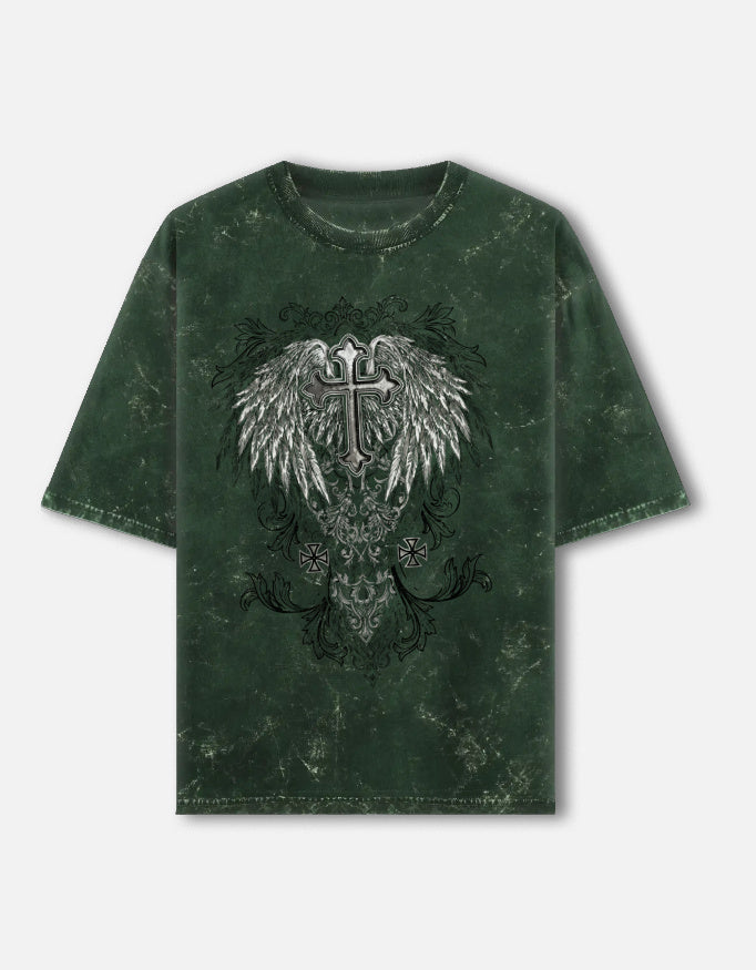 green t-shirt with graphic design on a beige background