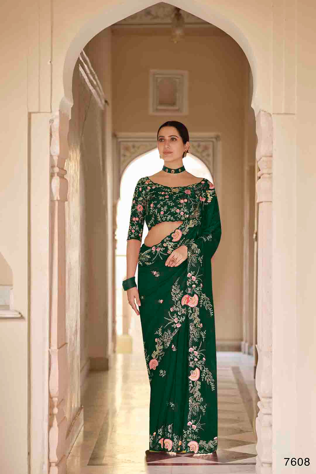 Woman wearing a Green embroidered Organza Saree & non stitched Dori, Thread, Sequins Organza Blouse.