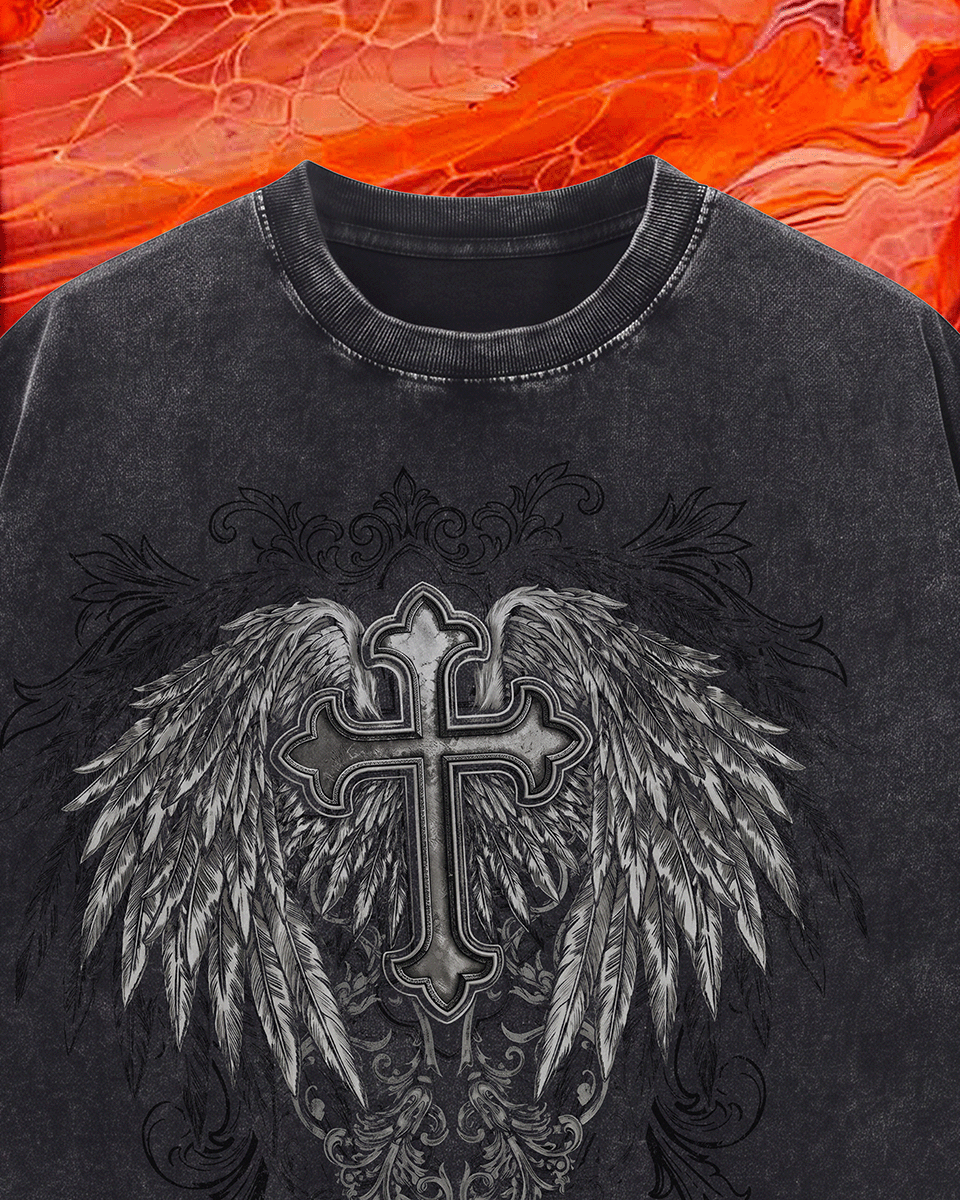 Black sweatshirt with a cross and wings design on a fiery background