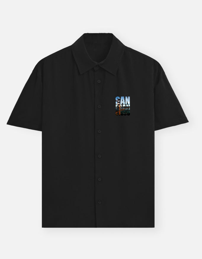 Maroon shirt with a graphic design on the chest against a white background
