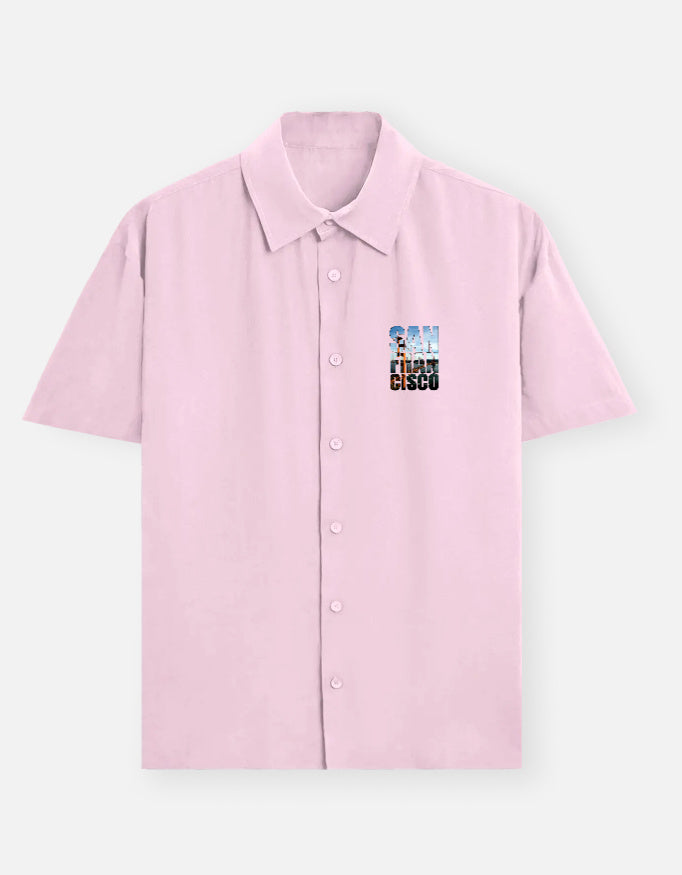 Pink shirt with a colorful logo on a white background