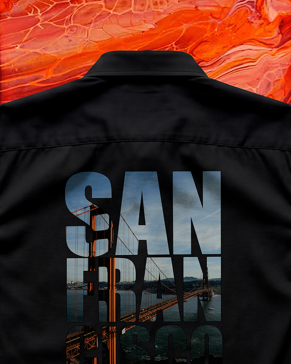 Black jacket with 'San Francisco' printed on it against a fiery orange background